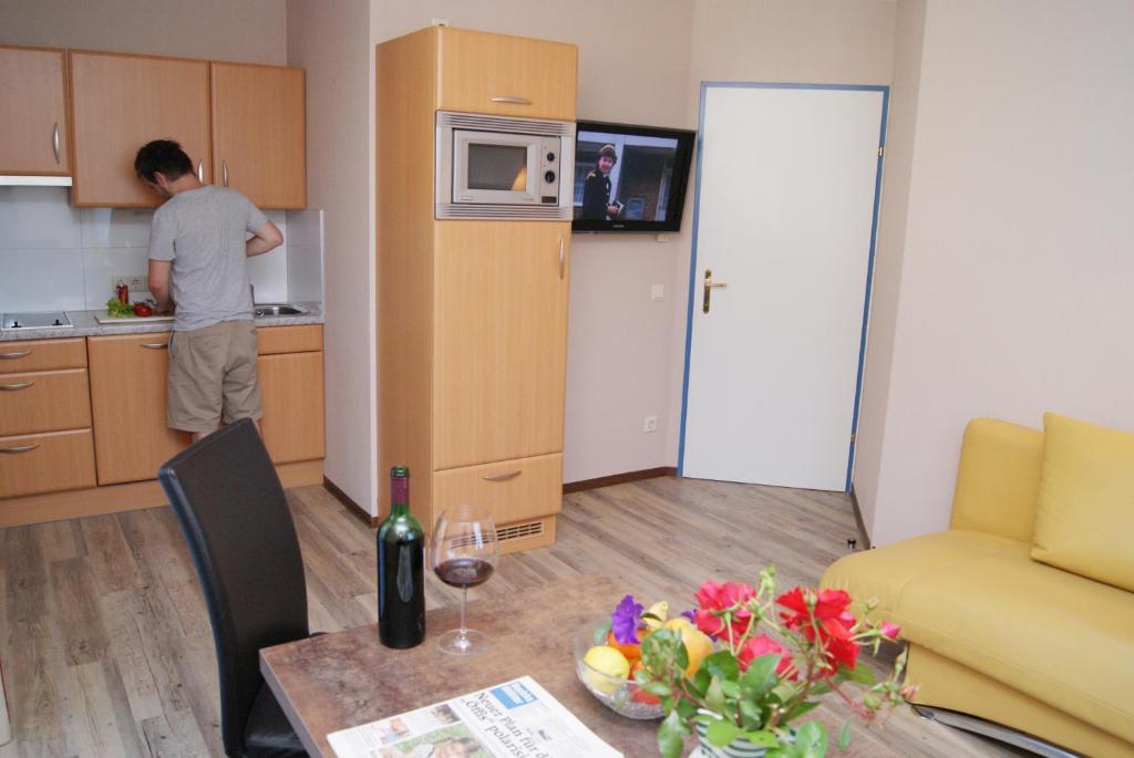 Kuchyňa alebo kuchynka v ubytovaní Apartments Hartsleben