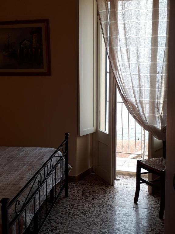 Posteľ alebo postele v izbe v ubytovaní L'Antico Faro