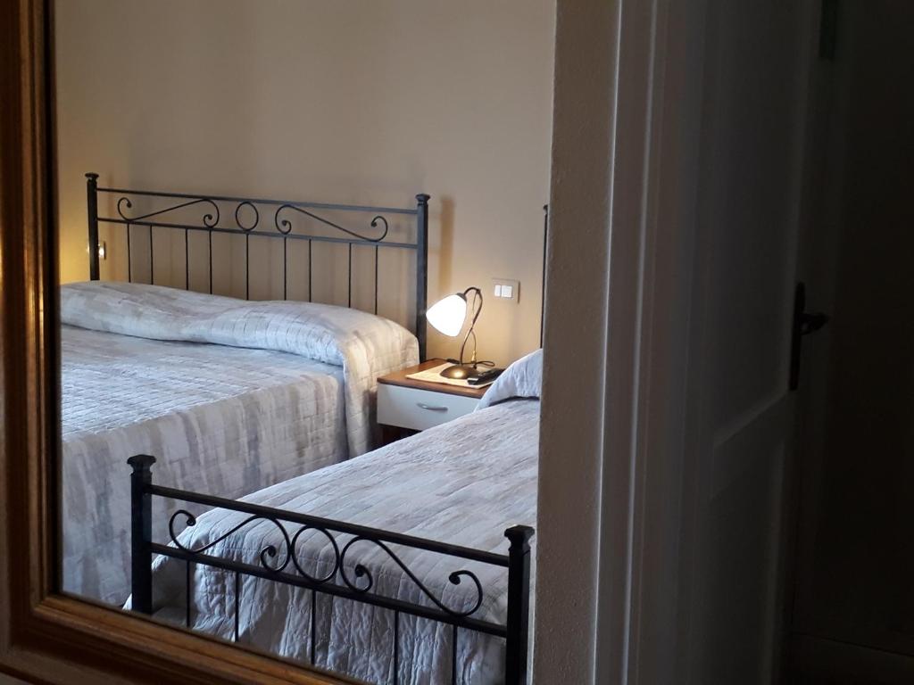 Posteľ alebo postele v izbe v ubytovaní L'Antico Faro