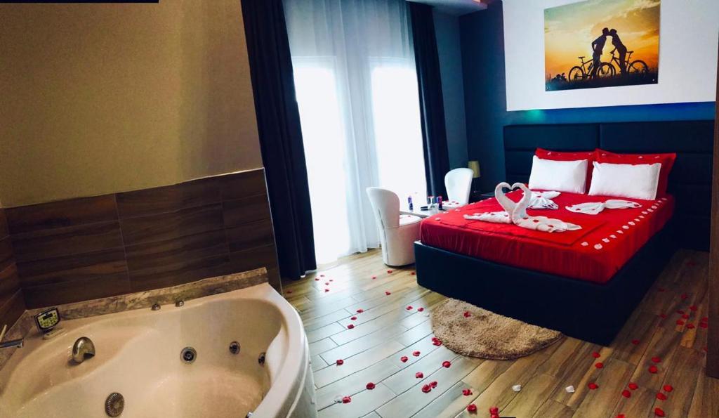 Uma cama ou camas num quarto em Hotel Golden