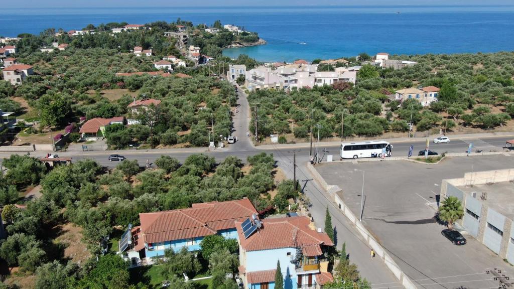 an aerial view of a town with the ocean at Elena Apartments stoypa in Stoupa