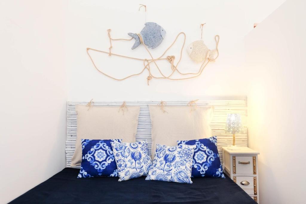 Postel nebo postele na pokoji v ubytování La Dimora al Mare