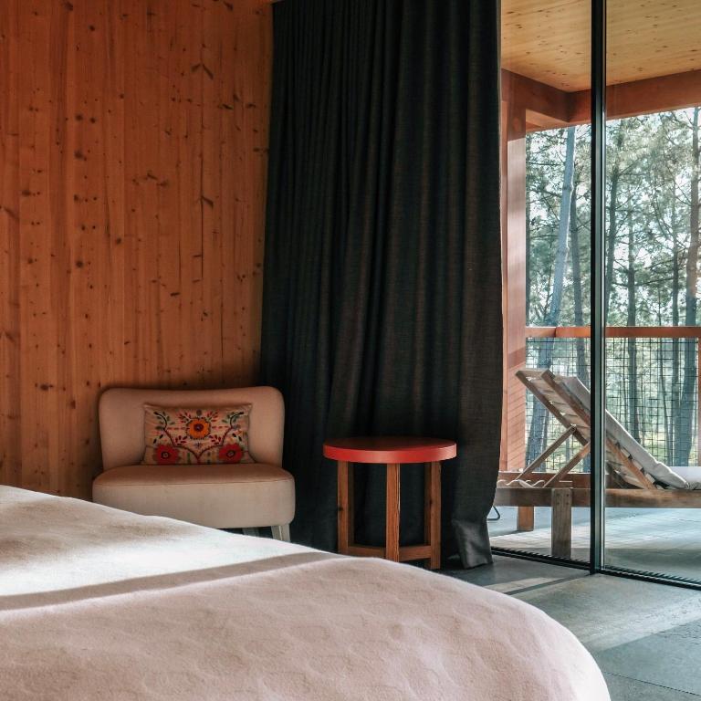 Postel nebo postele na pokoji v ubytování FeelViana Sport Hotel