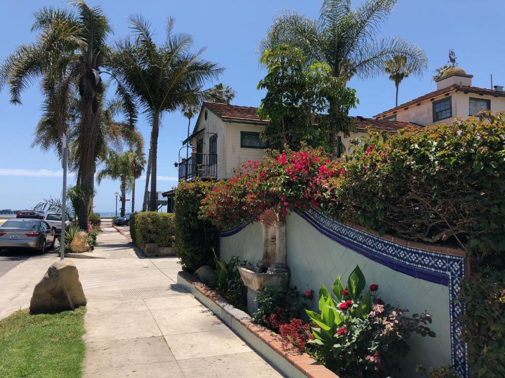a house with flowers on the side of a street at Ala Mar by the Sea in Santa Barbara