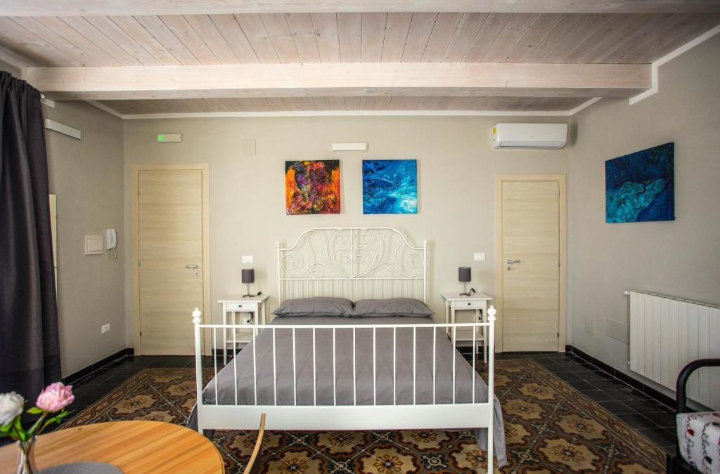 Postel nebo postele na pokoji v ubytování B&B La Mia Valigia