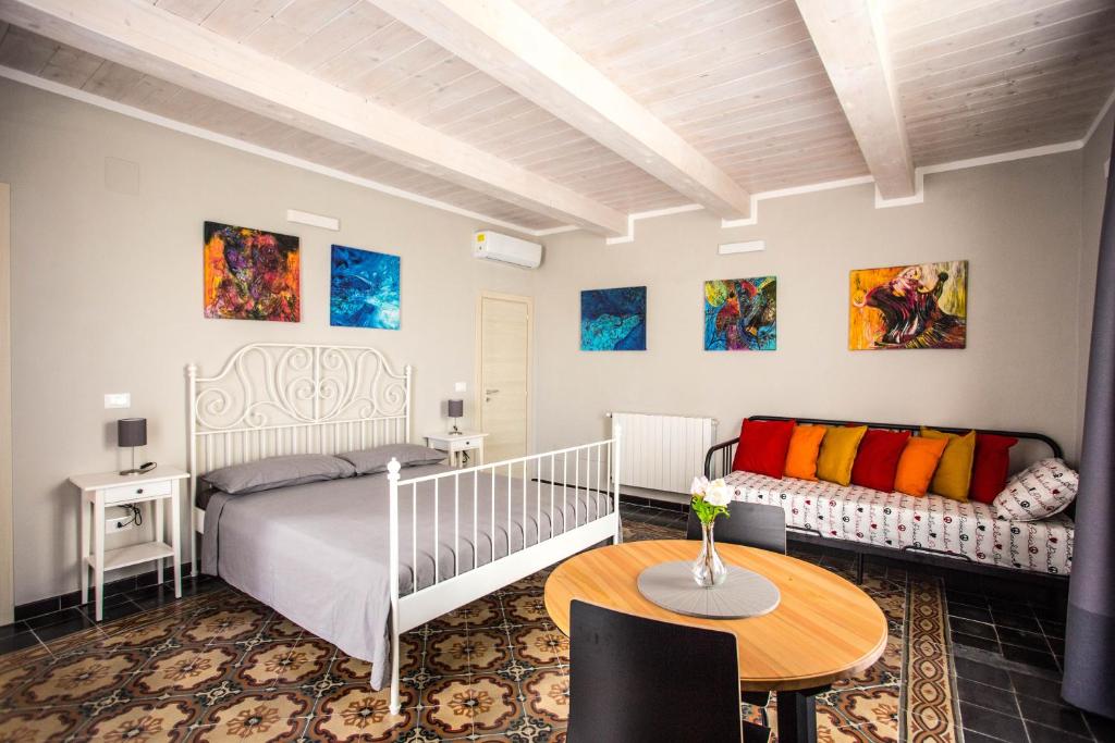 Postel nebo postele na pokoji v ubytování B&B La Mia Valigia