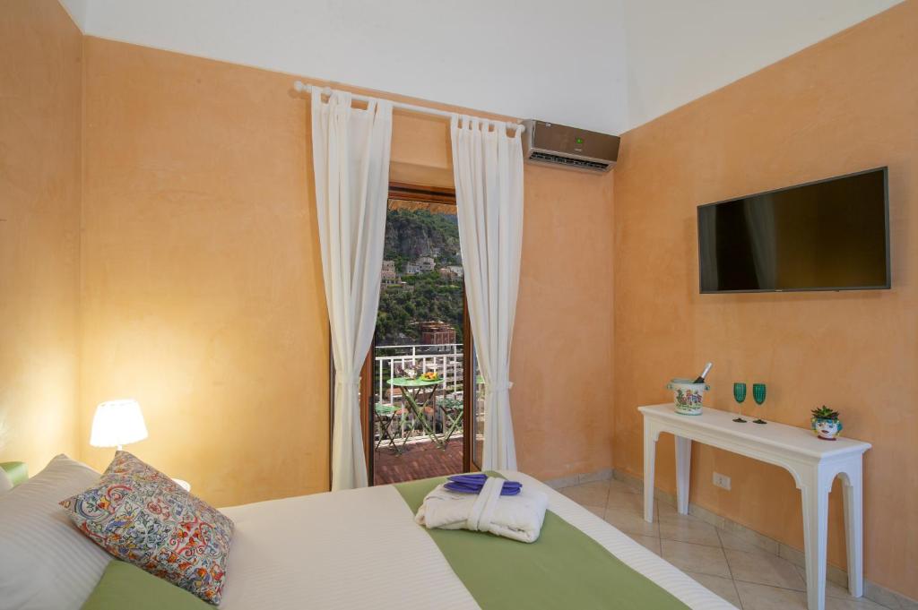 A television and/or entertainment centre at Villa Eos