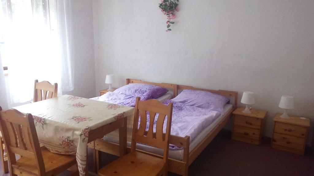 Postel nebo postele na pokoji v ubytování Pronájem pokojů Belle Vue