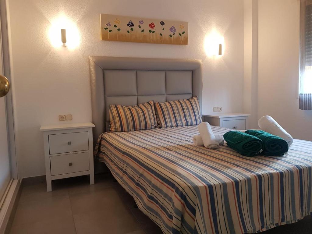 Posteľ alebo postele v izbe v ubytovaní Precioso Apartamento Frente Al Mar