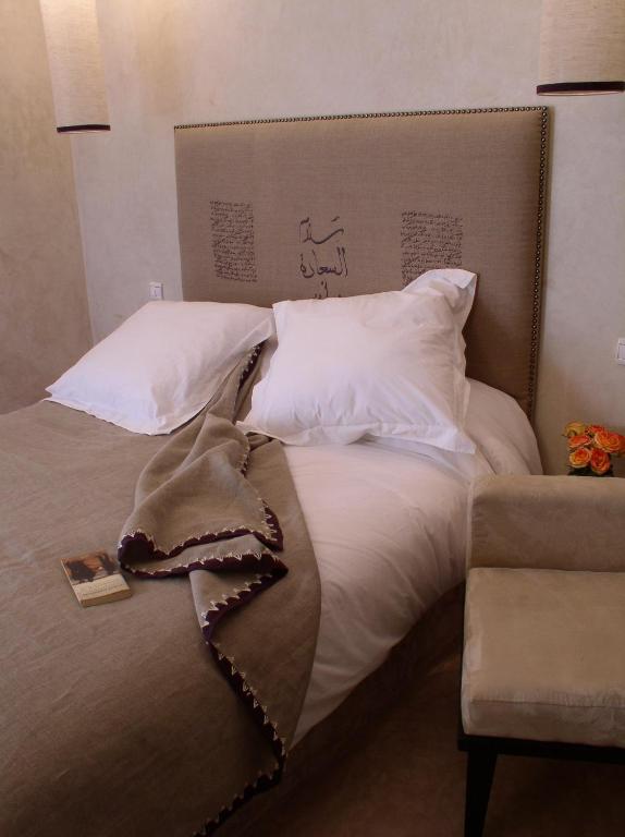 Postel nebo postele na pokoji v ubytování Riad Dar Selen