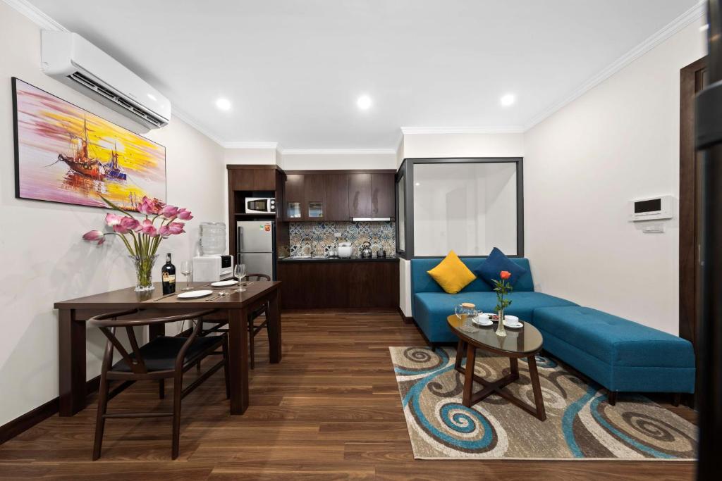 Kuchyň nebo kuchyňský kout v ubytování Newsky Serviced Apartment