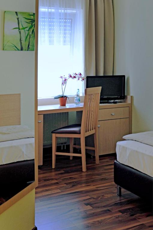 Voodi või voodid majutusasutuse Hotel Tannenhof toas