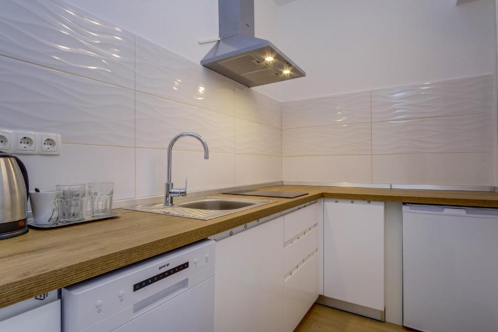 Kuchyň nebo kuchyňský kout v ubytování Apartment Marika