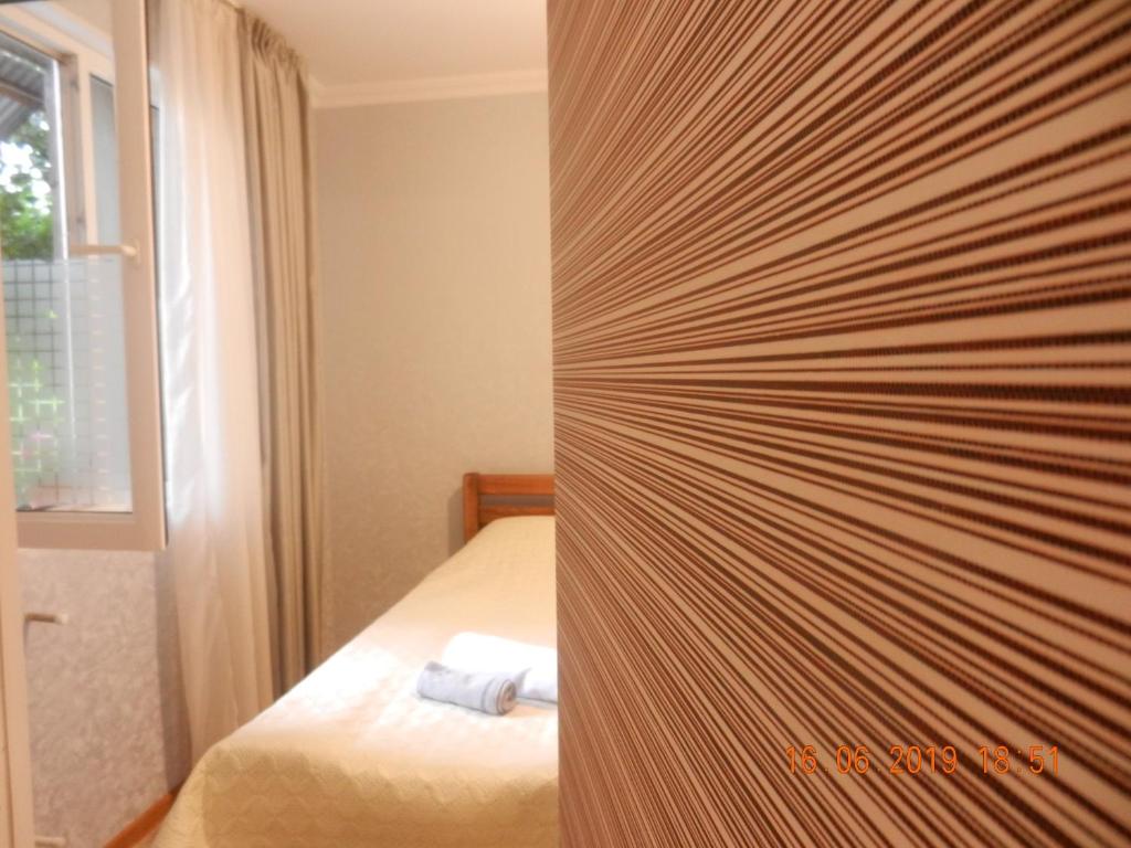 Postel nebo postele na pokoji v ubytování guest house katia tbilisi