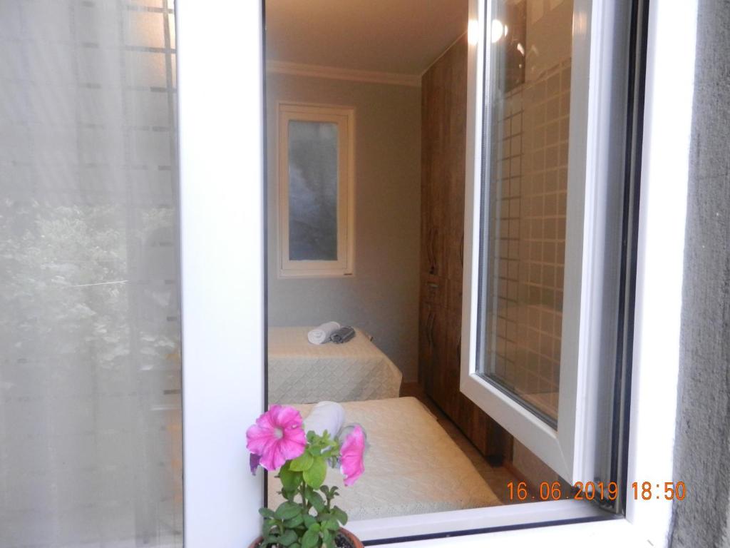 Postel nebo postele na pokoji v ubytování guest house katia tbilisi