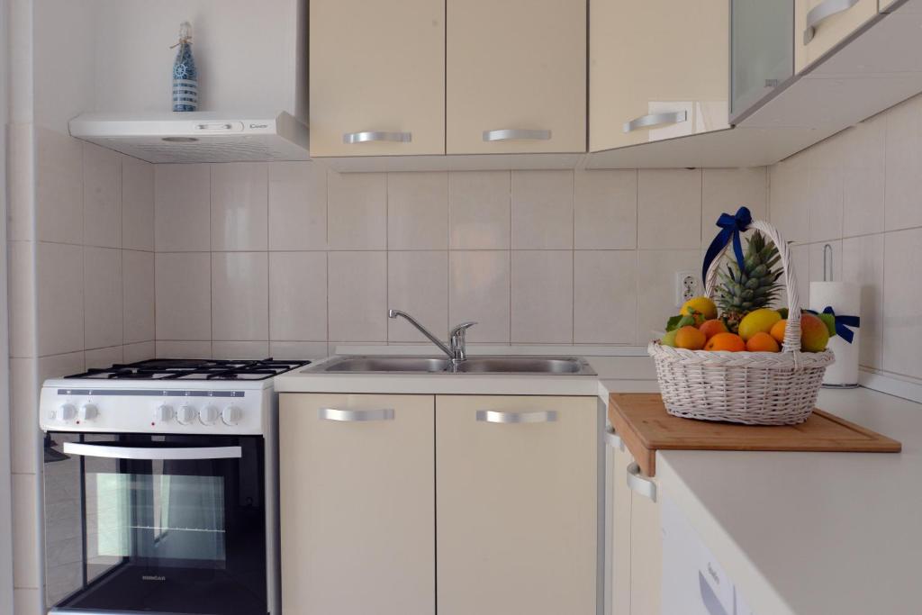 Kuchyň nebo kuchyňský kout v ubytování City roof top Apartment Cambi