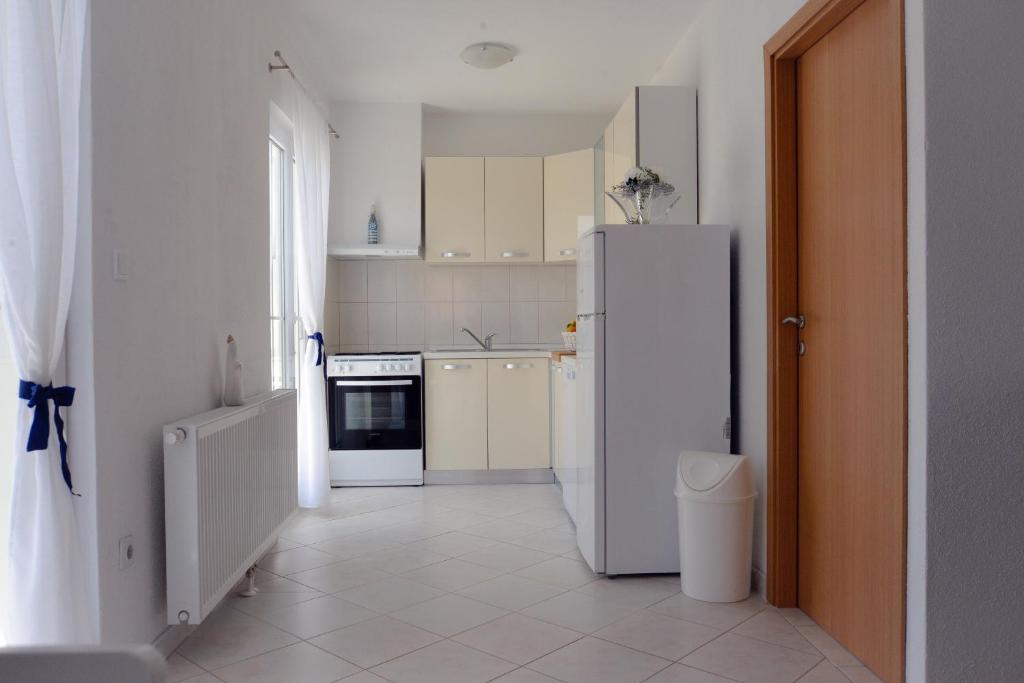 Kuchyň nebo kuchyňský kout v ubytování City roof top Apartment Cambi