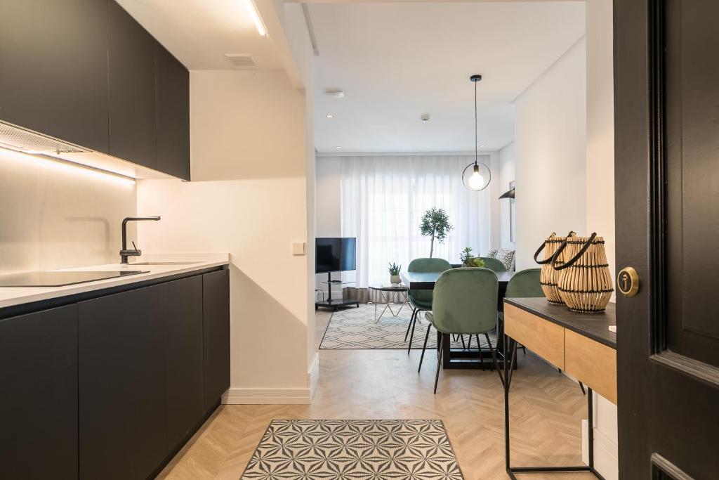 TV a/nebo společenská místnost v ubytování Feelathome Waldorf Suites Apartments