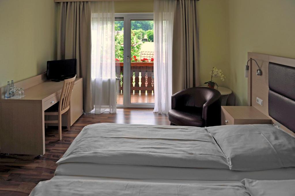 Voodi või voodid majutusasutuse Hotel Tannenhof toas