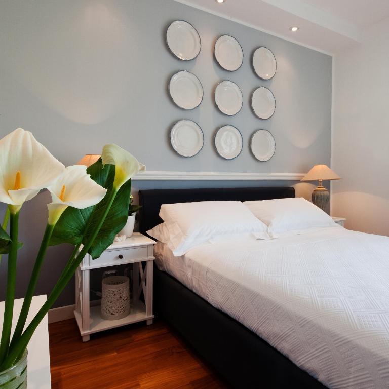 Postel nebo postele na pokoji v ubytování Cubo Apartments