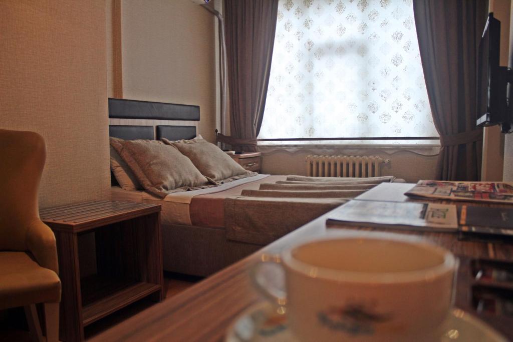 A seating area at Cmr Aydogan Hotel