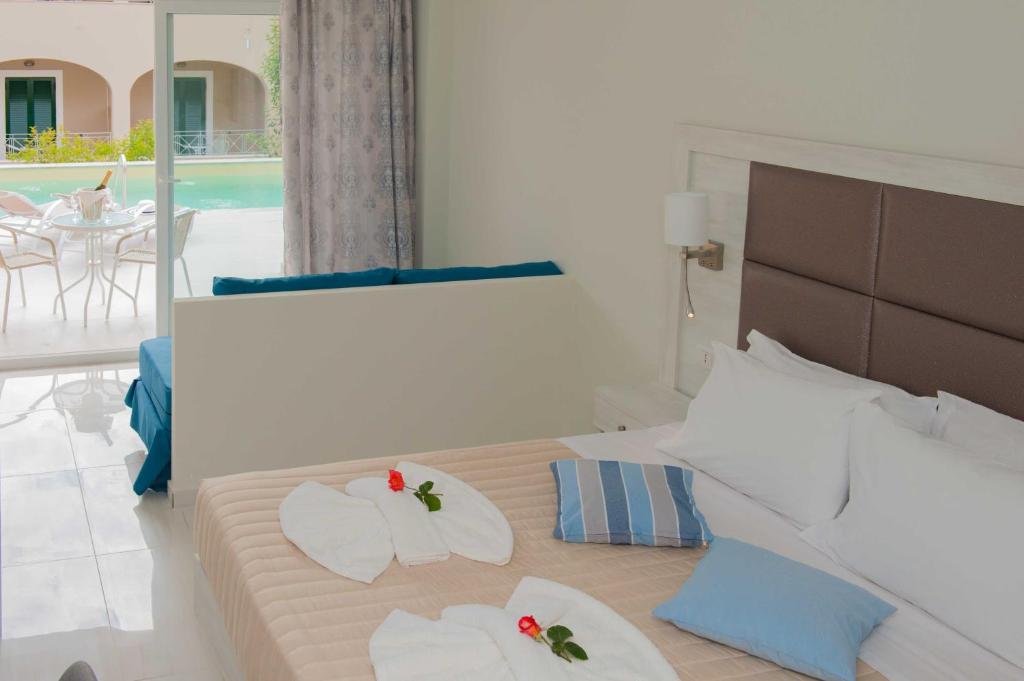 Postel nebo postele na pokoji v ubytování Amour Holiday Resort