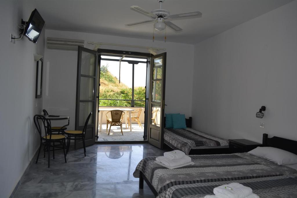 A bed or beds in a room at Arellis