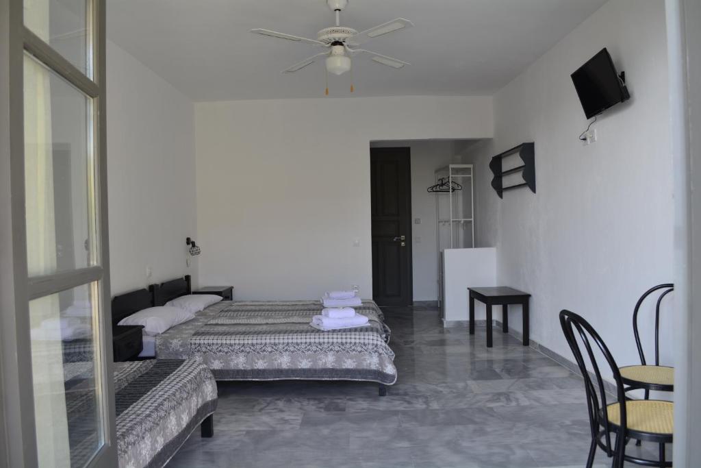 A bed or beds in a room at Arellis