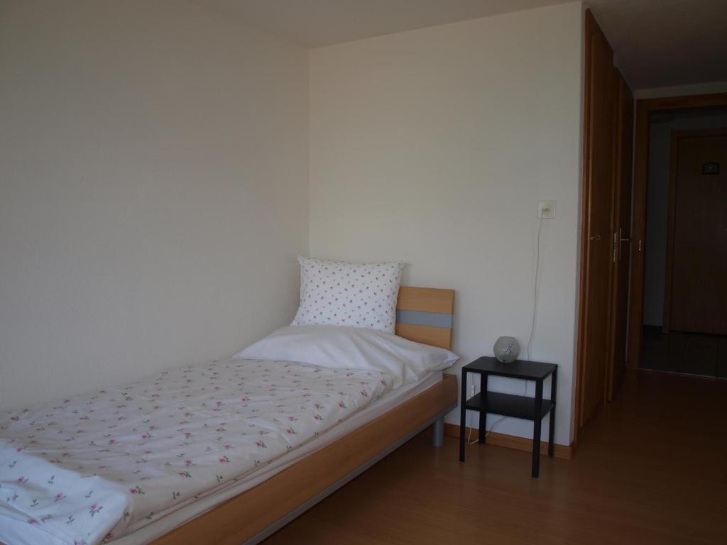 Postel nebo postele na pokoji v ubytování Gasthof Engelberg