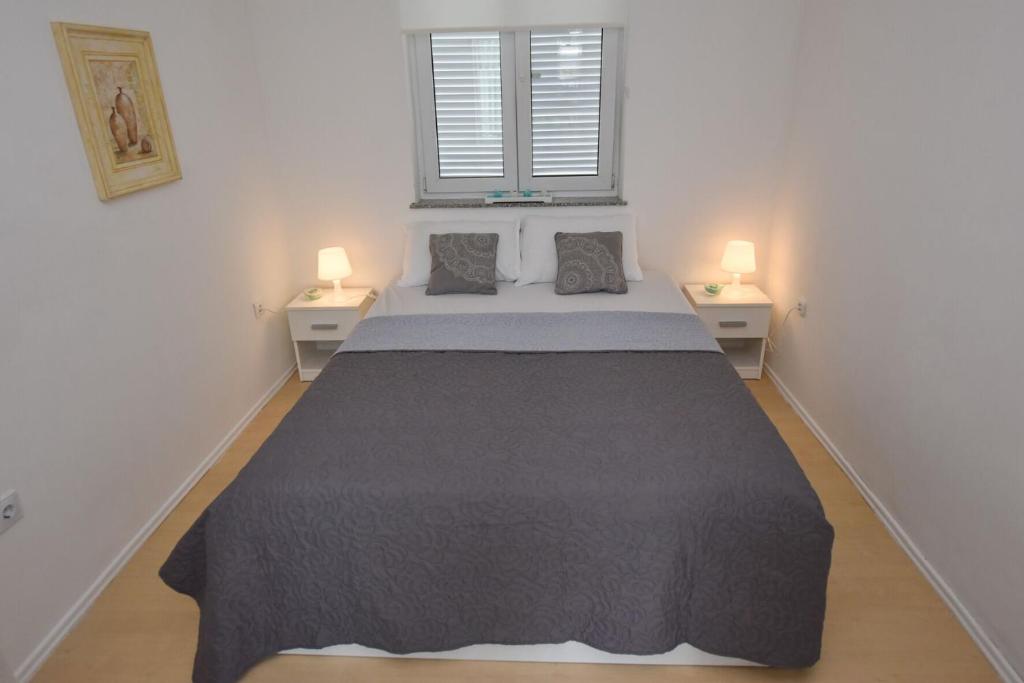 Postel nebo postele na pokoji v ubytování Apartment Bobby