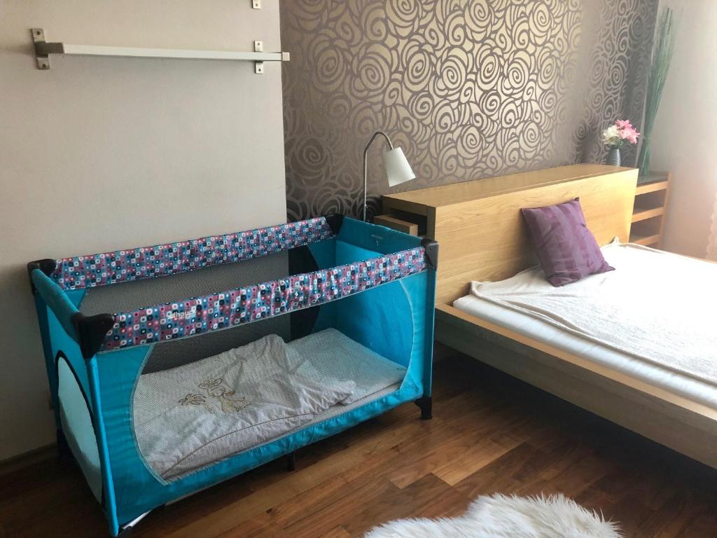 Postel nebo postele na pokoji v ubytování Apartmán SUZANNE