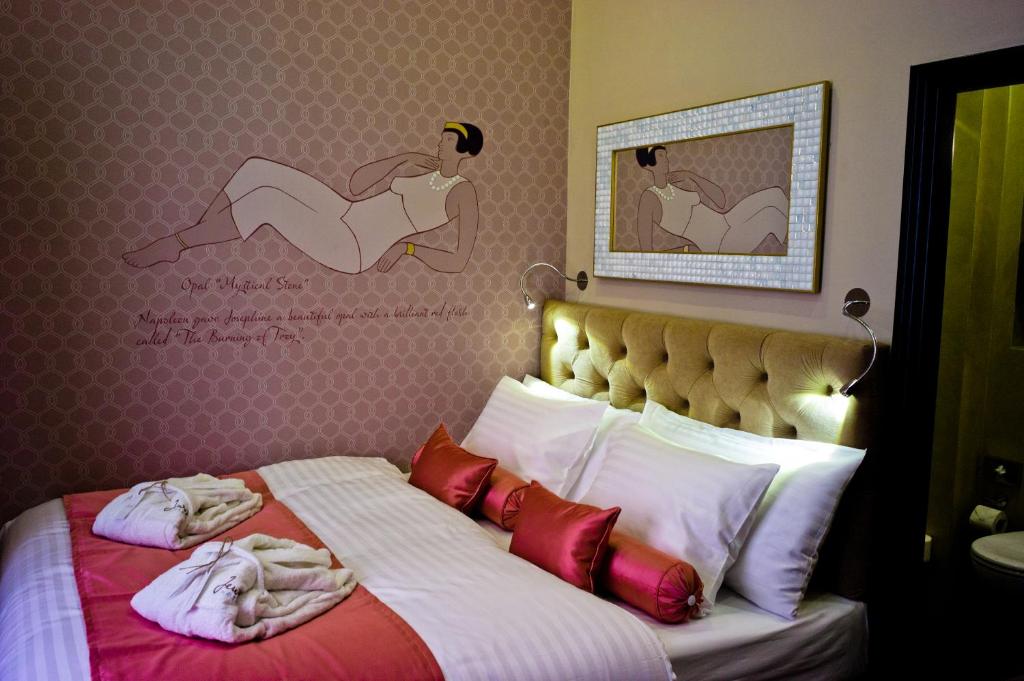 Łóżko lub łóżka w pokoju w obiekcie Design Hotel Jewel Prague