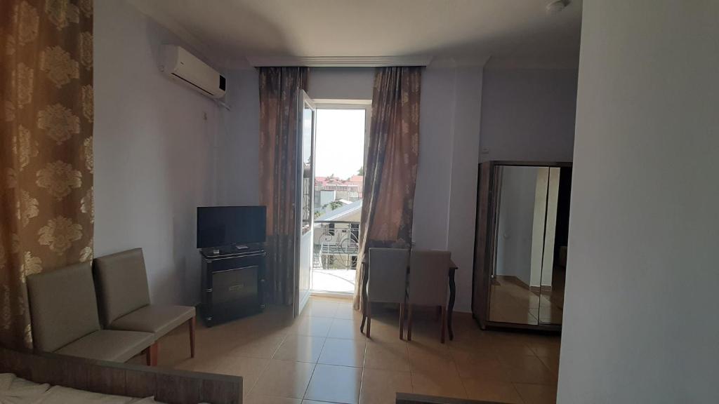 TV a/nebo společenská místnost v ubytování Hotel Evrazia
