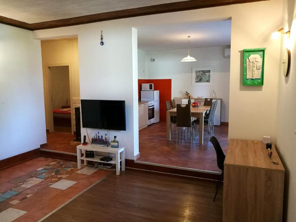 TV a/nebo společenská místnost v ubytování Casa Val Madorso