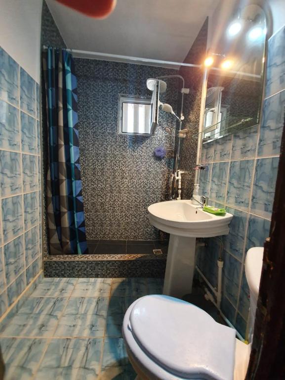 Koupelna v ubytování Apartament Maya