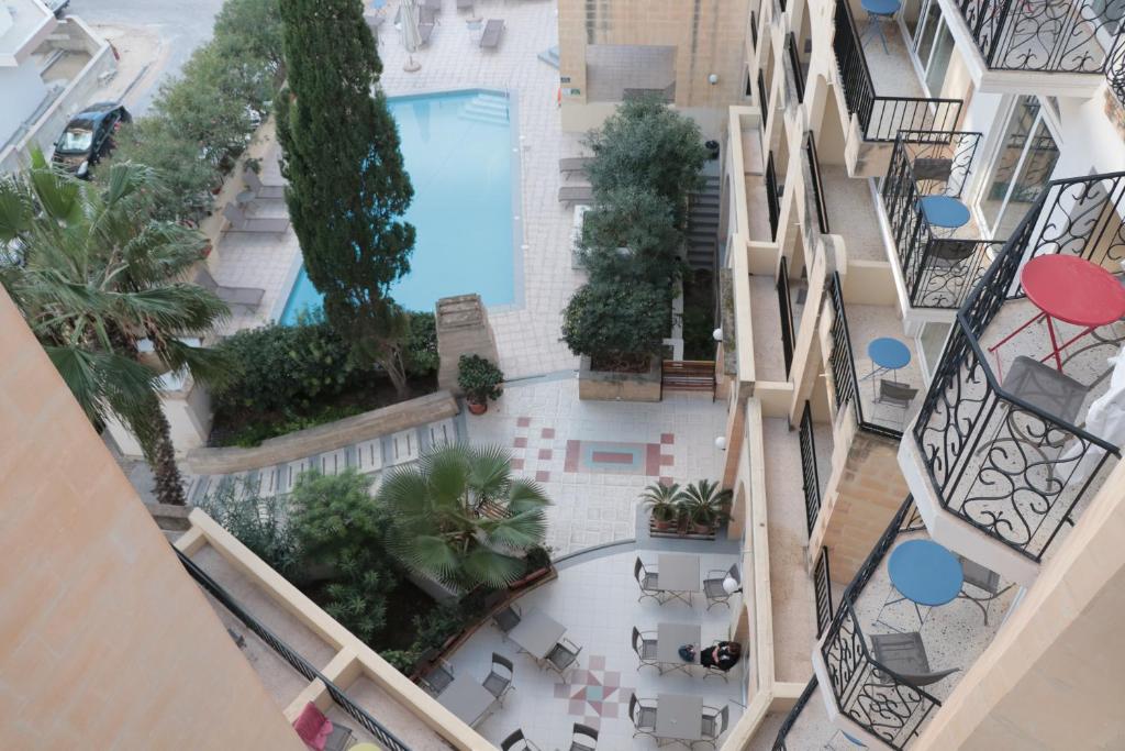 Bazén v ubytování Il Palazzin Hotel nebo v jeho okolí