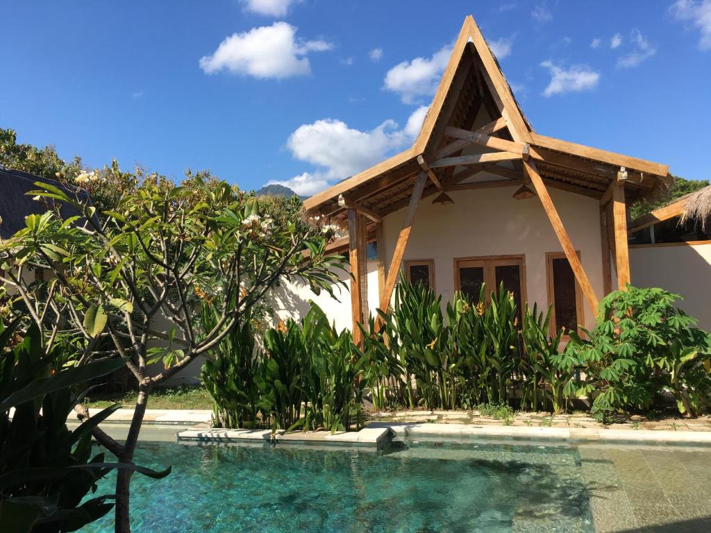 Bazén v ubytování Kalyssa Beach Bungalows nebo v jeho okolí