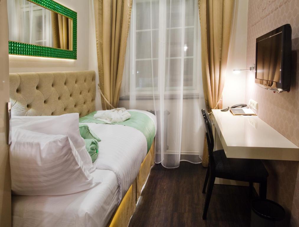Łóżko lub łóżka w pokoju w obiekcie Design Hotel Jewel Prague