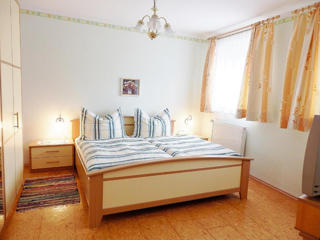 Postel nebo postele na pokoji v ubytování Ferienwohnungen Strohmayerhof