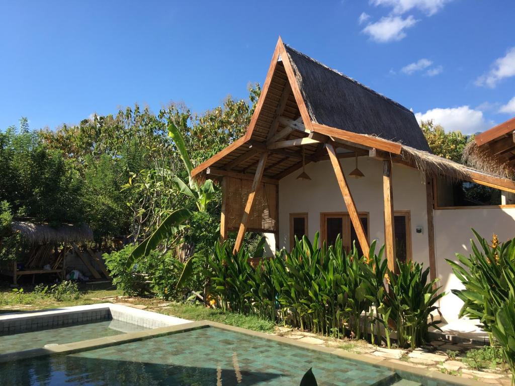 Bazén v ubytování Kalyssa Beach Bungalows nebo v jeho okolí