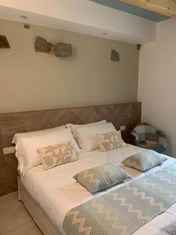 A bed or beds in a room at PERDAS ROOMS