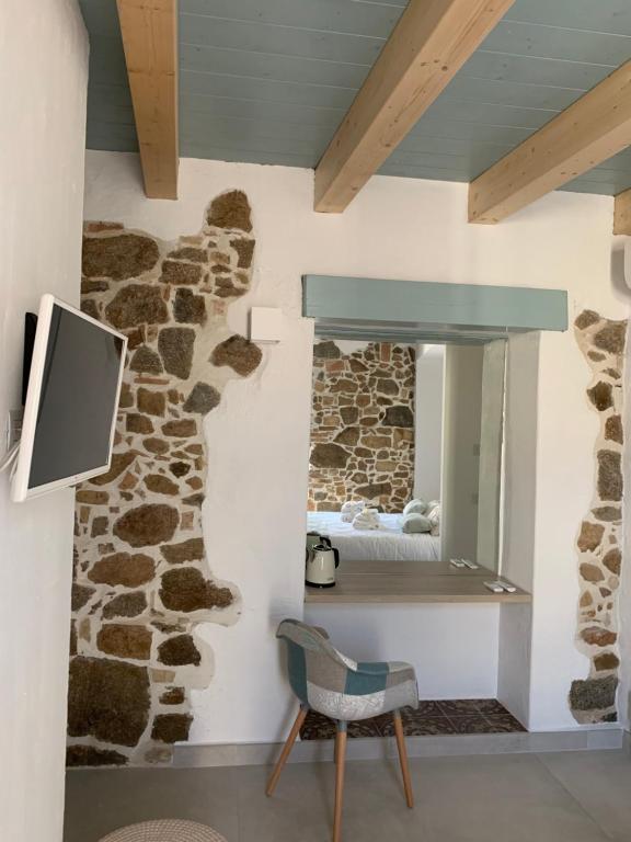 A television and/or entertainment centre at PERDAS ROOMS