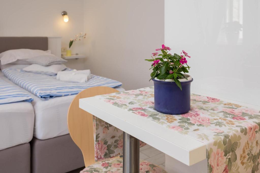 Posteľ alebo postele v izbe v ubytovaní Split Center Suites