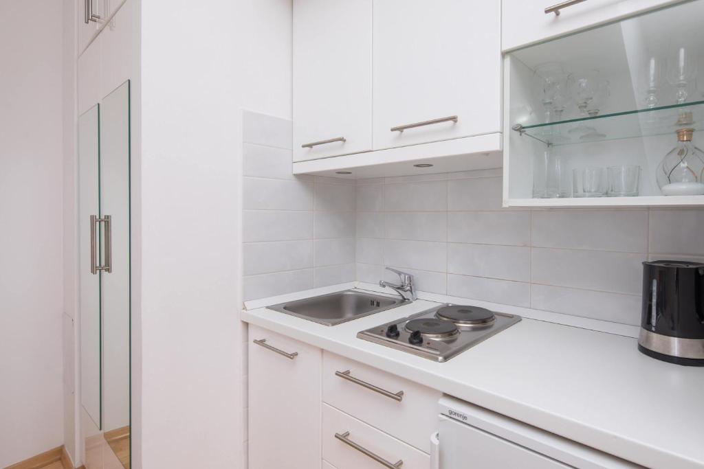 Kuchyňa alebo kuchynka v ubytovaní Split Center Suites