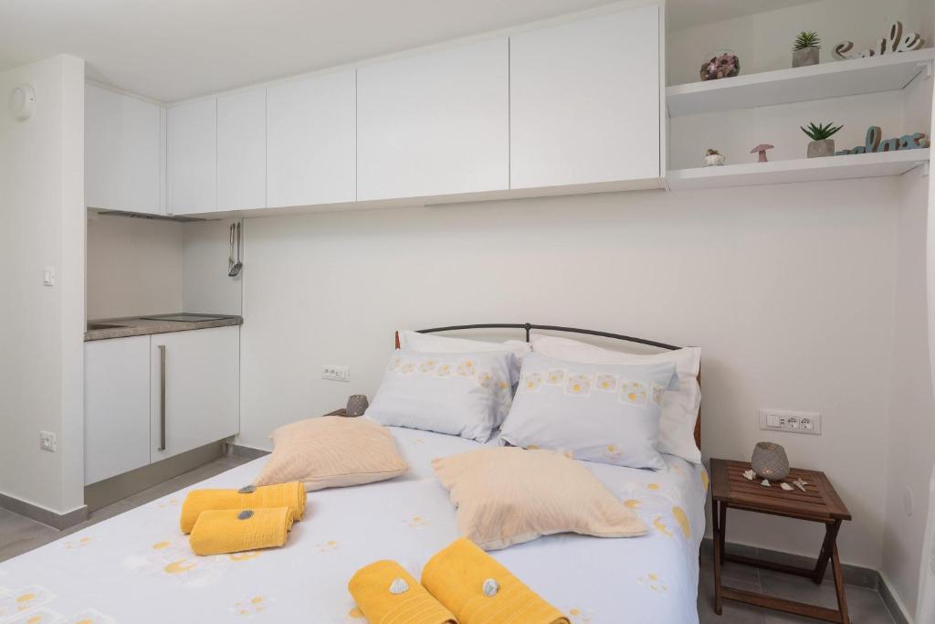 Posteľ alebo postele v izbe v ubytovaní Split Center Suites