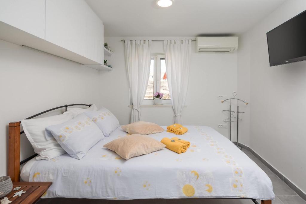 Posteľ alebo postele v izbe v ubytovaní Split Center Suites