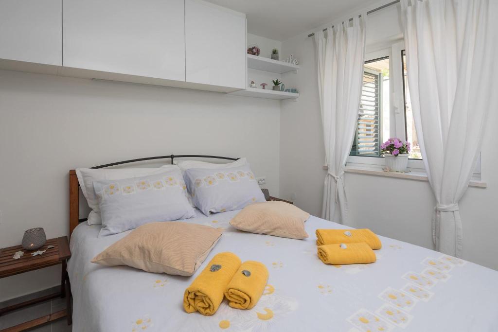 Posteľ alebo postele v izbe v ubytovaní Split Center Suites