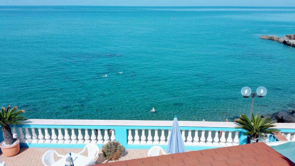 a view of the ocean from a balcony at Casa del Mare in Ischia