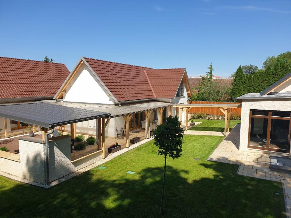 an aerial view of a house with a roof at Villa Quality Wellness in Dozmat
