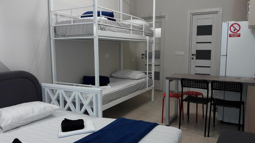 Postel nebo postele na pokoji v ubytování 10 Fontana House Mykonos
